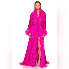 New With Tags. Bring On The Drama In Retrofete’s Neon Pink Juno Robe. This Over-The-Top Floor Length Silk Robe Features Ostrich Feather Trim Ties At The Waist And Was Designed To Make An Entrance Unlike Any Other. Self: 76% Acetate, 24% Polyester Trim: 100% Ostrich Feather (Ostrich Feathers Can Be Removed With A Button) Made In China Dry Clean Only Detachable Waist Tie Closure Midweight Sateen Fabric With Dyed Feather Trim Revolve Style No. Rofr-Wo83 Manufacturer Style No. Hl23-6494 Tags: Revolv Pink Feather Robe, Ostrich Feather Trim, Revolve Style, Top Floor, Feather Trim, Pink Feathers, Ostrich Feather, Silk Robe, Ostrich Feathers