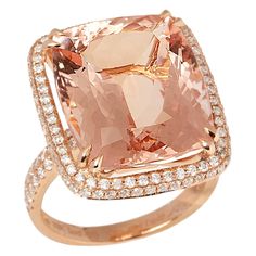 This ring designed by David Jerome is from his private collection and features one cushion cut morganite totalling 16.71cts sourced in Brazil. Set with round brilliant cut Diamonds totalling 0.45cts mounted in an 18k rose gold setting. UK finger size M 1/2, EU size 53 1/2, USA size 6 1/2. David prides himself in only sourcing the finest and most exclusive gemstones whose natural beauty and colour enhance the settings he creates for each piece. These exclusive designs offer buyers a unique opport Luxury Cushion Cut Diamond Topaz Ring, Luxury Diamond Topaz Ring With Cushion Cut, Luxury Morganite Diamond Ring With Halo Setting, Luxury Morganite Diamond Ring With Prong Setting, Luxury Cushion Cut Morganite Jewelry, Luxury Morganite Cushion Cut Jewelry, Luxury Morganite Cushion Cut Rings, Luxury Morganite Diamond Ring With Diamond Accents, Luxury Morganite Diamond Ring With Accents