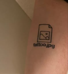 a tattoo on the leg of a man with an envelope in it's pocket