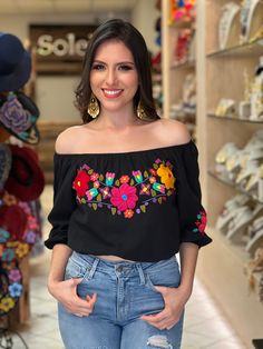 This Beautiful Off the Shoulder Crop Top is the perfect Top for a fun day out. It's made out of fine, soft Mexican Cotton and has elastic around the waist. The floral design is hand embroidered. Please Note: This blouse is hand embroidered and the embroidered colors vary on each blouse making each blouse one of a kind. Off Shoulder Mexican Blouse, Summer Embroidered Tops With 3/4 Sleeves, Summer Tops With Floral Embroidery And 3/4 Sleeve, Summer Floral Embroidery 3/4 Sleeve Tops, Multicolor Embroidered Tops With 3/4 Sleeve, Traditional Summer Tops With 3/4 Sleeves, Mexican Fiesta Party Outfit, Mexican Cowgirl Outfits, Mexican Outfits For Women