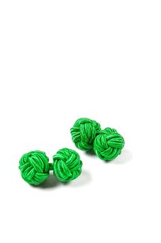 Add a classic look to your formal wear attire with this stylish cufflink set. Unique in design, these Solid Knot Cufflinks} are handcrafted into sleek looking knots. Rendered in a kelly green color, this set of cufflinks will add that extra special touch! An excellent choice for the man who's sense of style is more perceptive than most. Available in over thirty solid and mixed color combinations. Imported. Classic Green Cufflinks For Formal Occasions, Elegant Green Cufflinks For Formal Occasions, Classic Green Cufflinks For Gift, Classic Green Cufflinks As Gift, French Cuff Shirts, Cufflink Set, Kelly Green, In Design, Formal Wear