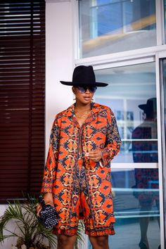 PRODUCT DETAILS: Designed in the U.S., hand-crafted in Africa Delivery within 2 weeks Print shown in Navy Blue and Burnt Orange A beautiful two piece set, designed using our traditional African Silk fabric with a multicolor pattern, that gives you a style and look made for turning heads! This set can be worn for multiple occasions including a dinner party, a wedding, getting brunch with some friends, or a party! Model is 5'9 FABRIC CARE: Dry Clean. Hand Wash. SIZE CHART: Red Bohemian Long Sleeve Sets, Traditional Orange Printed Sets, Bohemian Two-piece Blue Set, Bohemian Blue Two-piece Set, Bohemian Orange Long Sleeve Sets, Fitted Orange Bohemian Sets, Bohemian Batik Print Sets For Festive Occasions, Festive Bohemian Sets With Batik Print, Traditional Fitted Patterned Sets