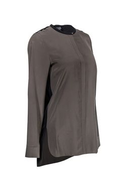 Two toned grey and black long sleeve blouse that can be dressed up or down. This top will look great paired with leggings and some chic sneakers. Dress this top up by pairing it with your favorite trousers, black pumps and luxe accessories. Size 4 100% Silk Button closure on neck Rounded v cut neckline Button cuffs Black back High-low hem Side slits Bust 38" Shoulder to hem 30" Elegant Black Blouse With Shirttail Hem, Fall Business Casual Stretch Blouse, Fall Stretch Blouse For Business Casual, Sleek Business Casual Blouse For Fall, Stretch Blouse For Business Casual In Fall, Gray Tops For Business Casual In Fall, Gray Fall Tops For Business Casual, Gray Business Casual Tops For Fall, Stretch Fall Workwear Blouse