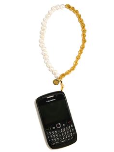 Not your grandmother's pearls. 16" Freshwater pearl and gold plated brass French rope chain phone leash Drop: Approx 8" Handmade in New York City and Puerto Rico. Due to the handmade nature of our products, some charms may vary in color and style or be replaced if unavailable. Please allow 5-7 business days for production. Phone Leash, Hair Rings, Jewelry Inspo, Rope Chain, Ring Bracelet, Men Necklace, Phone Accessories, Puerto Rico, Ring Earrings