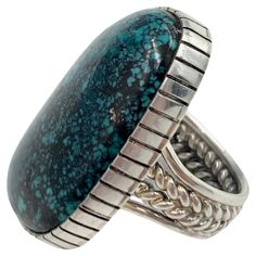 Old King’s Manassa Turquoise Sterling Silver Ring by Navajo Silversmith Alfred Lee. Size: 8 The King's Manassa turquoise mine, or more accurately the "King Turquoise Mine", is located near Manassa, Colorado. It is one of the many turquoise deposits which was actively mined by Native Americans for centuries. I.P. King rediscovered the mine in 1890, and the King family has operated it ever since. It was originally called the Lick Skillet Mine. Alfred Lee Jr. (Chuck) is a sixth generation Navajo jeweler with a nationwide reputation. He and his brother Albert were inspired and mentored by their father Alfred Lee Sr., who is himself an award winning artist. Shiprock, New Mexico is home to the Lee brothers. It is there that they go about their business of creating, necklaces, bracelets, Concho b P King, Shiprock New Mexico, Luxury Artisan Multi-stone Turquoise Ring, Unique Multi-stone Turquoise Ring In Sterling Silver, Turquoise Multi-stone Gemstones In Sterling Silver, One-of-a-kind Silver Turquoise Ring In Sterling Silver, Old King, Concho Belt, Adjustable Southwestern Turquoise Ring Nickel-free