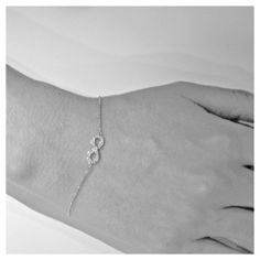 "Infinity refers to something without any limit. Our beautiful diamond Infinity jewelry is the perfect way to celebrate endless love or friendship. This special bracelet is available in your choice of 14k white, yellow, or rose gold! **Diamonds** 25 brilliant, full-cut, round diamonds, total weight 0.15 ct. VS2-SI1 clarity, G-H color **Setting and Chain** 14k gold, total weight 1.7 g 7\" chain adjustable to 7.75\" **Measurements** Be sure to check out our other Infinity items: http://www.etsy.co Classic Sterling Silver Infinity Bracelet, White Gold Infinity Bracelet For Formal Occasions, Formal White Gold Infinity Bracelets, Formal White Gold Infinity Bracelet, Silver Infinity Diamond Bracelet For Anniversary, Classic Infinity Bracelets For Anniversary, Infinity Diamond Bracelet With Accents For Anniversary, Elegant Infinity Bracelet With Diamond Accents, Anniversary Infinity Bracelet In Cubic Zirconia