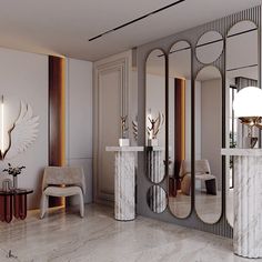 an elegant living room with marble floors and mirrors on the wall, along with two chairs