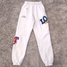 Brand New Madhappy Local Optimist Sweatpants Size Xsmall. There Is A Hole At The Top Right Side Of Pants, Please Refer To Pictures. There Is Also A Few Dirt Spots That Should Wash Out. I Would Totally Put A Cool Patch Over The Hole, Easy Fix That Way. White Athleisure Bottoms With Letter Print, Athleisure White Bottoms With Letter Print, White Letter Print Sweatpants In Athleisure Style, High Waist White Sweatpants For Streetwear, Trendy White Loungewear Bottoms, White Letter Print Bottoms For Loungewear, White High Waist Cotton Sweatpants, Casual White Pants With Letter Print, White Casual Pants With Letter Print