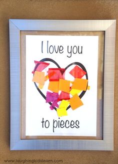 i love you to pieces made out of paper and colored crayons in the shape of a heart