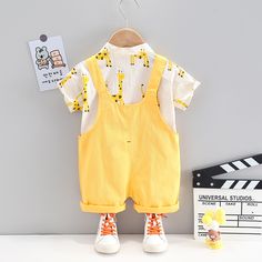 Spring / Summer 2 Pcs Cartoon Clothing Set for Toddlers Giraffe Shirt – Pink & Blue Baby Shop Cute Summer Sets With Pockets, Playful Summer Sets With Cartoon Print, Sleeveless Cotton Cartoon Print Sets, Sleeveless Cotton Set With Cartoon Print, Yellow Sets For Playtime In Summer, Yellow Sets For Summer Playtime, Playful Summer Sets With Pockets, Yellow Summer Playtime Sets, Yellow Playtime Sets For Summer