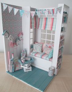 a doll house with furniture and accessories in it