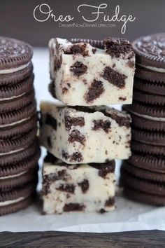 oreo fudge is stacked on top of each other with cookies in the background