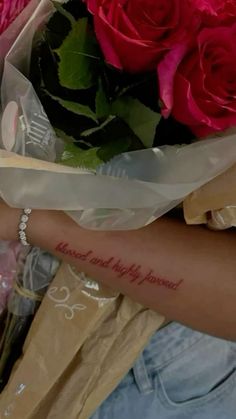 a woman holding a bouquet of roses with the words, i love you