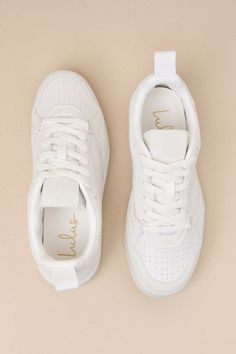 Bring a cute and sporty vibe to all your everyday looks with the Lulus Mezereon White Sneakers! Smooth faux leather and soft faux suede come together to form these cute sneakers that have a round toe with perforated accents and a vintage-inspired design. Lace-up vamp and pull tab at back. Bumper sole completes the look. Available in Euro sizing only. 1" bumper sole. Lightly cushioned insole. Rubber sole has nonskid markings. Man made materials. Imported. Lulus | Mezereon White Sneakers | Size 40 Casual Suede Platform Sneakers With Laces, Sporty Platform Sneakers With Speckled Midsole, Leather Sneakers With White Laces For Spring, Casual Platform Sneakers With Round Toe And Perforations, Sporty Everyday Platform Sneakers With Perforated Toe Box, Casual Synthetic Platform Sneakers With Perforations, Casual Platform Sneakers With Perforations, Trendy White Suede Sneakers, Casual Everyday Sneakers With White Laces