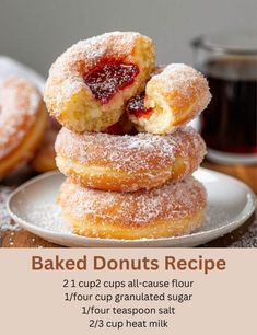 a stack of doughnuts sitting on top of a white plate