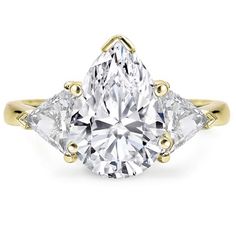 a three stone engagement ring with two pear shaped diamonds