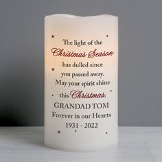 Product Code: P0409E07 This beautiful Personalised Christmas Season Memorial LED Candle is a beautiful way to remember a loved one. Personalise this candle with up to 3 lines of personalisation Line 1 - 20 Characters Line 2 - 25 Characters Line 3 - 25 Characters 'The light of the Christmas Season has dulled since you passed away. May your spirit shine this Christmas' is fixed text and cannot be changed. Line 1 is fixed upper case. Lines 2 & 3 will appear as entered. The LED candle has a flame ef Led Pillar Candle, Memorial Candle, Special Symbols, Led Candle, Unique Candles, Flameless Candles, Personalized Candles, Gift Finder, Led Candles