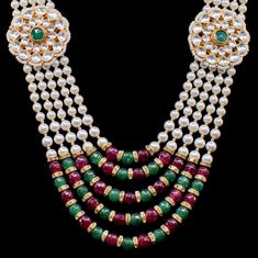 A spot-on reminiscent of the old world charm! An attractive long mala featuring classy strings of faux pearls together with emerald and ruby stones with two kundan motifs on each side. Approximate mala length is 11". Gold-plated on high-quality brass as base metal. Made by order. Kindly allow 5-7 weeks for the delivery of this item. For custom or urgent requests, please contact support@alacouture.com. *Please Note: We use faux stones and beads in all of our jewelry. Traditional Pearl Chain Beads For Festive Occasion, Diwali Kundan Necklace With Polished Beads, Kundan Mala With Round Beads In Temple Jewelry Style, Festival Kundan Mala With Polished Beads, Kundan Mala With Tilla And Round Beads, Kundan Mala With Tilla Details And Round Beads, Diwali Kundan Mala With Polished Beads, Festive Kundan Mala With Round Beads, Traditional Kundan Necklace With Pearl Chain And Round Beads