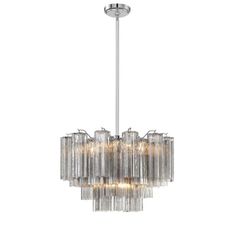 a large chandelier with clear glass tubes hanging from it's ceiling fixture