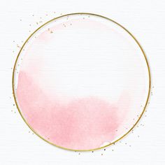 a pink and gold circle frame on a white paper with some gold dots around it