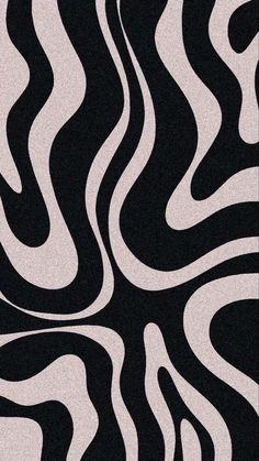 an abstract black and white background with wavy lines in the shape of zebra's stripes