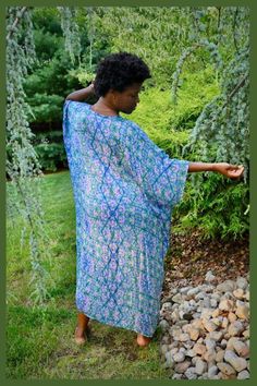 Our timeless Obaatan Kaftan embodies elegant comfort and divine femininity. Made from the most lustrous bamboo rayon, this luxurious fabric offers a modern yet feminine feel and is flattering on every figure. With its draped silhouette and fluid, feminine shape, it is the ultimate in comfort and style, in our eclectic butterfly inspired print, this is the throw on dress you'll wear again and again. Bohemian Rayon Kaftan For Beach, Flowy Rayon Maxi Dress With Kimono Sleeves, Bohemian Rayon Kaftan For Beach Cover-up, Rayon Kaftan With Kimono Sleeves, Blue Bohemian Rayon Kimono, Long Bohemian Rayon Kaftan, Bohemian Dress With Kimono Sleeves In Rayon, Bohemian Dress With Rayon And Kimono Sleeves, Bohemian Rayon Dress With Kimono Sleeves