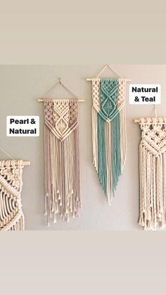 three macrame wall hangings are hung on the wall next to each other