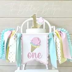 an ice cream themed 1st birthday cake stand