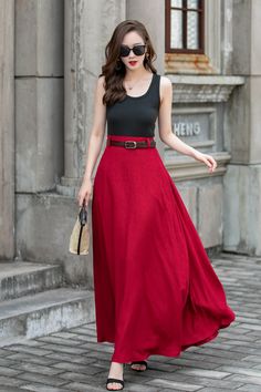 "Crafted from premium linen fabric, this skirt offers a combination of comfort and sophistication. The high-waisted design accentuates your waistline, creating a flattering silhouette. The swing style adds a playful and feminine touch, allowing for effortless movement and flow. Whether you're going for a casual day out or dressing up for a special occasion, this red linen skirt is a versatile and timeless addition to your wardrobe. DETAIL * 100% linen * High waisted skirt * Two side pockets * Plus size skirt * Circle skirt * Perfect summer spring skirt * Dry clean * The model is 168cm (5′ 6″) tall with a 80cm (31.5\") bust, 66cm (26\") waist. She is wearing a XS. CUSTOM MADE SERVICE If you * Change other color * Need a better fit * Can't find your size in our size Chart * Change the Style Raspberry Wool Maxi Skirt High Waist, Luxury Red Skirt For Workwear, Luxury Red Skirt For Festive Season, Affordable Casual Red Pleated Skirt, Luxury Red Maxi Skirt For Spring, Long Red Skirt Tight, Luxury Red Maxi Skirt For Summer, Affordable Red High Waist Skirt, High Waisted Skirt Red