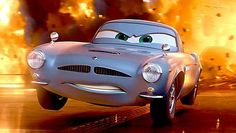 the character from cars is shown in front of a fire