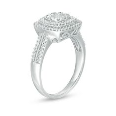 Complete your casual or dressy look with this sophisticated and sparkling cushion-shaped multi-diamond frame ring. Crafted in cool 10K white gold The center diamond composite - centered with a 1/20 ct. diamond - sparkles in two stepped cushion-shaped diamond frames. Along the shank, two ribbons of diamonds lend more drama to the design. This ring shines with 3/8 ct. t.w. of diamonds. Frame Ring, Diamond Frame, Peoples Jewellers, Sparkle Diamonds, Diamond Ring, Drama, White Gold, Diamonds, Sparkle