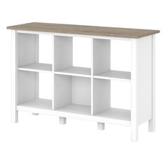 a white bookcase with wooden top and four shelves on one side, against a white background