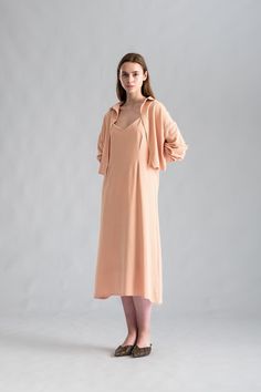 The Monica Casual Blossom Long Sleeves Dress Set features a classic, laid-back design perfect for any occasion. Made with high-quality woven fabric, this dress set is comfortable and versatile, making it ideal for leisure, home, or vacation wear. It also includes collared buttons and adjustable straps to ensure a perfect fit for all body types. Elevate your wardrobe with this must-have dress set! ᴄᴏᴍᴘᴏꜱɪᴛɪᴏɴ85% cotton and 15% linen ꜱɪᴢᴇ ᴀɴᴅ ꜰɪᴛFit Type: ShiftFabric Stretch: No Stretch Elegant Cotton Summer Sleepwear, Elegant Summer Cotton Sleepwear, Elegant Cotton Sleepwear For Summer, Spring Cotton Loungewear Dress, Spring Midi Dress With Relaxed Fit For Daywear, Spring Relaxed Fit Midi Dress For Daywear, Feminine Summer Shirt Dress For Daywear, Summer Beige Shirt Dress For Daywear, Casual Slip Dress For Spring Day Out