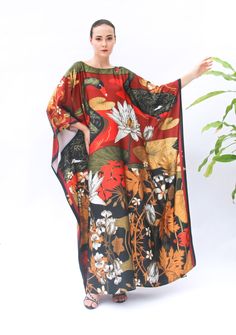 A full length kaftan plus size featured with the vintage inspirations feature the tree of life print  will bring the elegant vibe of Oriental' spring and would be a perfection for holiday occasions or any eventn you attend. The fabric is blended silk with more than 80% silk so the care is more easier with washing and iron, in addition less wrinkles. It's totally smoothly flowy, soft and gentle touch. FEATURES - Black, Red, Yellow - Tree of Life, Vintage Vibe - Personal Custom Made - Full Length Red Floral Print Kaftan With Kimono Sleeves, Red Kaftan With Floral Print And Kimono Sleeves, Vintage Multicolor Long Kaftan, Red Flowy Kaftan With Kimono Sleeves, Flowy Red Printed Kaftan, Vintage Long Kaftan For Beach, Red Floral Print Tunic Kaftan, Red Oversized Bohemian Kaftan, Kaftan Art