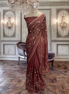 Beautiful brown shimmer georgette saree with sequins work and running blouse piece Traditional Georgette Pre-draped Saree With Sequins, Elegant Pre-draped Chiffon Saree, Diwali Party Wear Georgette Pre-draped Saree, Traditional Drape Sequined Blouse For Diwali, Traditional Drape Sequin Blouse Piece For Diwali, Semi-stitched Sequin Chanderi Pre-draped Saree, Semi-stitched Chanderi Pre-draped Saree With Sequins, Diwali Sequined Traditional Drape Blouse Piece, Designer Wear Pre-draped Georgette Saree With Sequins