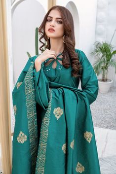 SKU: 1603 Price for Shirt, Pant and Dupatta The classic Green silk outfit with mirror embroidery and perfect stitched gives a perfect look to this ensemble. The hand block and screen print in Gold Dupatta complete the look of this classic outfit. Shirt length 42. Model is wearing S. Green Silk Outfit, Gold Dupatta, Mirror Embroidery, Shirt Pant, Classic Outfit, Silk Outfit, Designer Dress, Green Silk, Classic Outfits