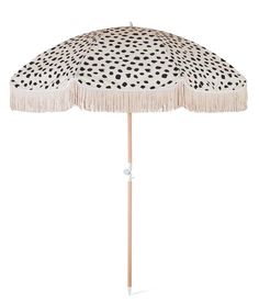 an umbrella with black and white spots on it