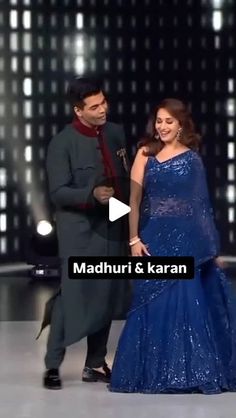 a man and woman dancing on stage with the caption madhuri & karan