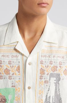 You may start thinking of lunch as soon as your slip on this breezy and whimsically cross-stitched linen shirt. 28" length (size Medium) Front button closure Notched collar V-neck Short sleeves 100% linen Hand wash, dry flat Imported Embroidered Relaxed Fit Casual Camp Shirt, Casual Embroidered Cotton Camp Shirt, Embroidered White Short Sleeve Camp Shirt, Cotton Embroidered Shirt With Camp Collar, Embroidered Linen Shirt With Camp Collar, Embroidered Linen Collared Shirt, Upcycle Dress, Stitch Shirt, Meal Deal