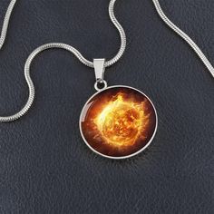 Embrace the transformative energy of the Fire element with this meaningful necklace. It's a perfect reminder to tap into your inner strength, ignite your passions, and rise above any challenge. Purchase This Best-Seller and We Guarantee It Will Exceed Your Highest Expectations! ➜ Our patent-pending jewelry is made of high quality surgical steel with an 18k gold finish option. This Jewelry Item Is the Perfect Keepsake! Whether for Yourself or a Loved One. ➜ If the custom engraving option is available, engrave onto the back of the pendant your loved one's name, your wedding date, an anniversary, or anything else you want to remember and keep you close to her heart. Each personalized piece offers exceptional craftsmanship that is fit to be an instant classic in your family. We Offer a 100% Ha Element Necklace, Meaningful Necklace, Fire Element, Flame Design, Luxury Necklace, Rise Above, Inner Strength, Pitcairn Islands, Guinea Bissau