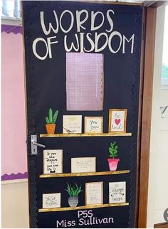 a classroom door decorated with pictures and magnets for the word's of wisdom