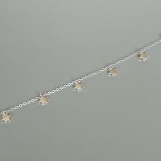 Sterling silver chain bracelet with star charms.Length:6 to 7 inches   Flower charm: 4 x 4 mm.  Weight: 1.5 gmThis bracelet is made of 925 hypoallergenic sterling silver.Can be packaged in a gift box. I can include a personal message from you if needed_______________________________________You are welcome to contact me at...   bhavnakwintra1956@gmail.com_______________________________________ For more beautiful pieces from my shop, please browse 👇TOE RINGS:https://www.etsy.com/your/shops/TheSil Celestial Bracelet, Stars Bracelet, Bracelet Valentines, Wanderlust Jewelry, Gift Bracelet, Rose Bracelet, Silver Chain Bracelet, Star Bracelet, Skull Earrings