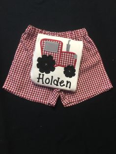 This cute short set has an appliquéd Tractor on a White Shirt or Bodysuit with Matching Green Gingham Shorts. Bodysuits come in NB-18m The shirts come in sizes 6, 12, 18, 24(2t) months 3t, 4t and 5t. Diaper Covers come in NB-18m The shorts come in sizesNB, 3, 6, 9, 12, 18, 24(2t) months 3t 4T and 5t If you would like a different applique or monogram to match the shorts Or if you would like a different color combo message me. I love to create new things. Thanks for visiting my shop. Cute Gingham Cotton Bottoms, Casual Cotton Gingham Sets, Casual Gingham Cotton Sets, Plaid Cotton School Bottoms, Gingham Cotton Short Sleeve Set, Gingham Cotton Set With Short Sleeve, Red Cotton Shorts For School, Cute Plaid Cotton Sets, Cute Gingham Cotton Sets