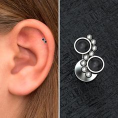 a woman's ear is shown with three balls and two circles on the side