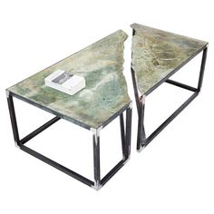 two tables with marble top and metal legs