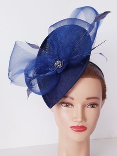 Fabulous navy blue wedding fascinator, bridal hat Luxury You collection Limited Edition Fantastic flowers hand made with much attention to detail. This item is made for custom order in many colors.. The hat is on headband for easy and secure positioning Please, don't copy my pictures- it's my work and my veils design Blue Mini Hats With Handmade Flowers For Royal Ascot, Formal Blue Fascinator With Handmade Flowers, Elegant Blue Fascinator With Handmade Flowers, Elegant Blue Headpiece With Handmade Flowers, Elegant Blue Fascinator For Formal Occasions, Blue Fitted Fascinator For Wedding, Elegant Short Brim Fascinator For Mother Of The Bride, Elegant Blue Headband Fascinator, Adjustable Blue Hat For Wedding