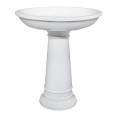 a white pedestal sink on a white background