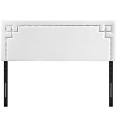 an upholstered headboard with black and white trimmings on the frame