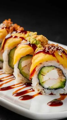 several sushi rolls on a white plate covered in sauce