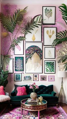 a living room filled with lots of pictures and plants on the wall next to a green couch